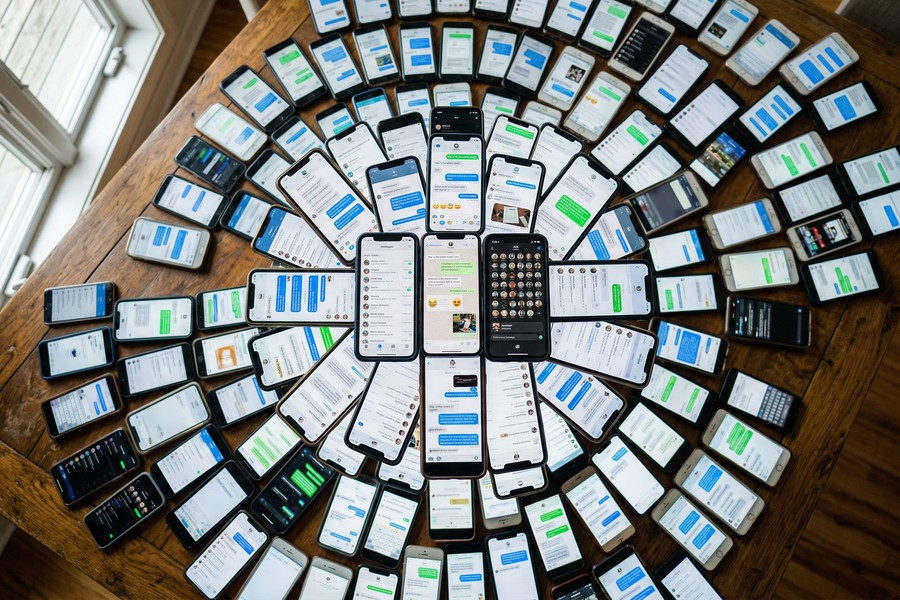 Side-by-side feature comparison screen of Telegram and WhatsApp mobile interfaces