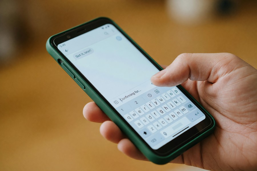 Side-by-side comparison of SKEDit and Scheduled app interfaces on iPhone showing scheduling calendar views