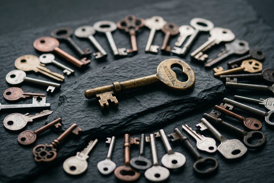 Person reviewing a suspicious text message on a smartphone screen, finger hovering near a suspicious link