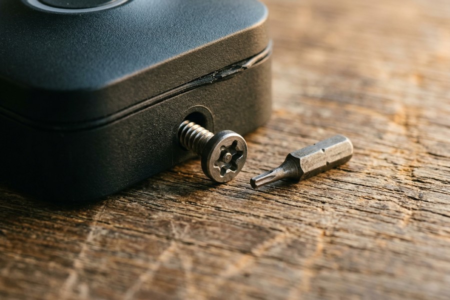 Smart doorbell mounted at 48 inches on brick exterior wall next to front door