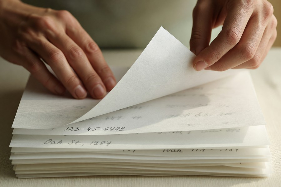 Infographic showing three-layer defense strategy against SIM swap attacks