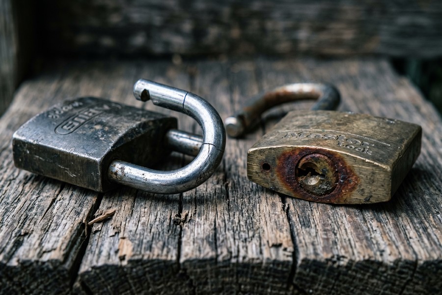 Side-by-side diagram of browser password storage versus dedicated app vault encryption architecture