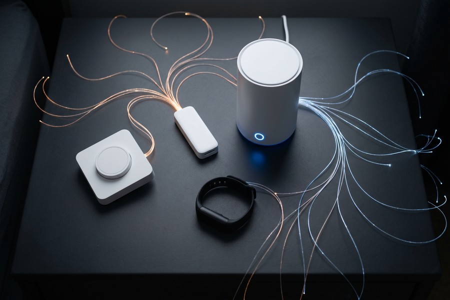 Smartphone screen showing Alexa routine setup with smart bulb schedule and air quality trigger