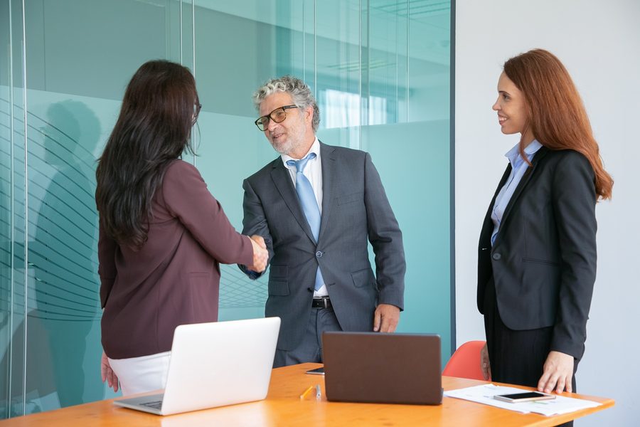 Client and therapist discussing consent form