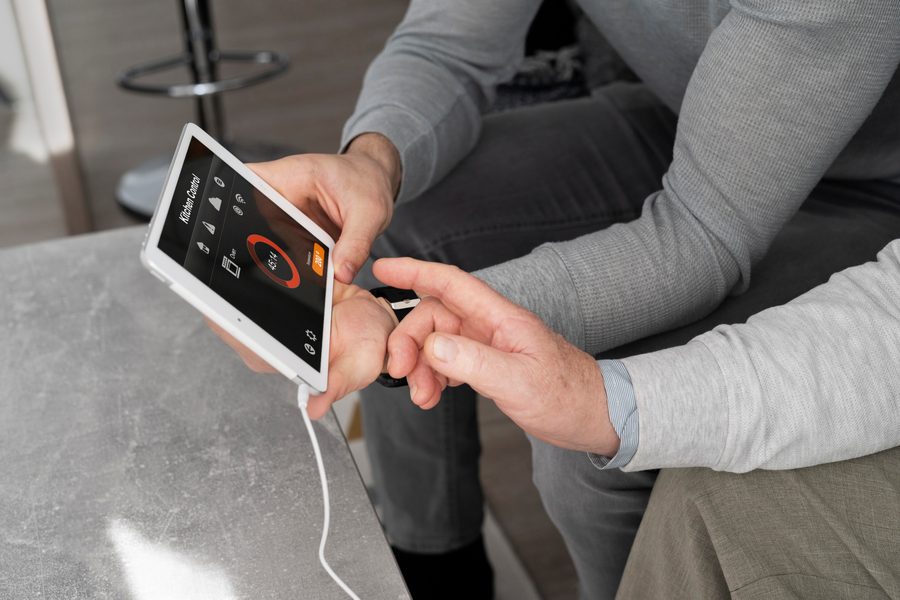 Phone across the room, alarm on nightstand, distance reduces temptation