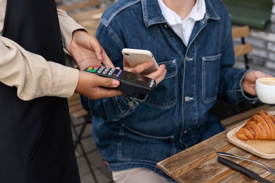 Image of a sleek, minimalist wallet with just a phone