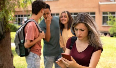 College student using phone hacks during finals week study session