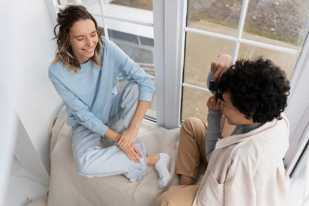 Person sending a thoughtful message on a secure messaging app as part of a daily emotional recovery routine