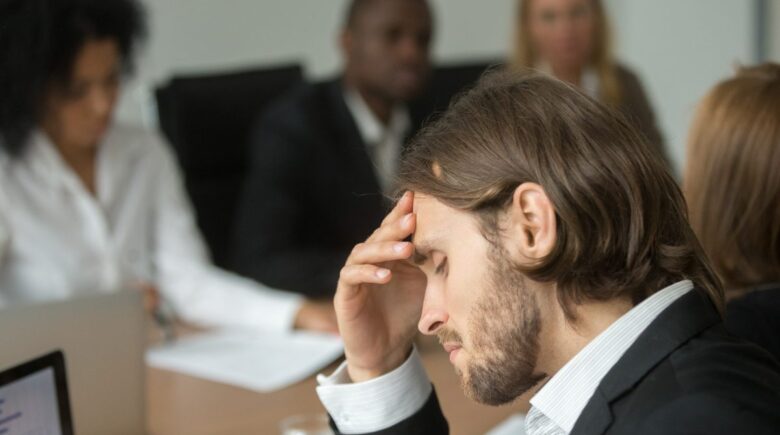Professional using Proton Mail scheduled send feature on desktop to draft and schedule emails during peak focus hours