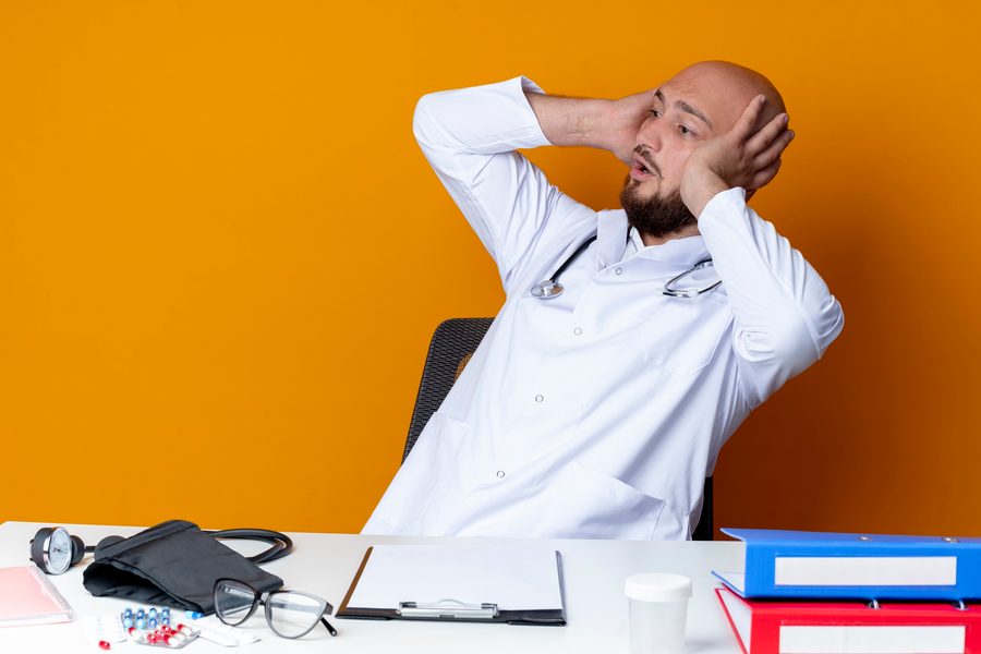 Professional under stress checking phone after message is read