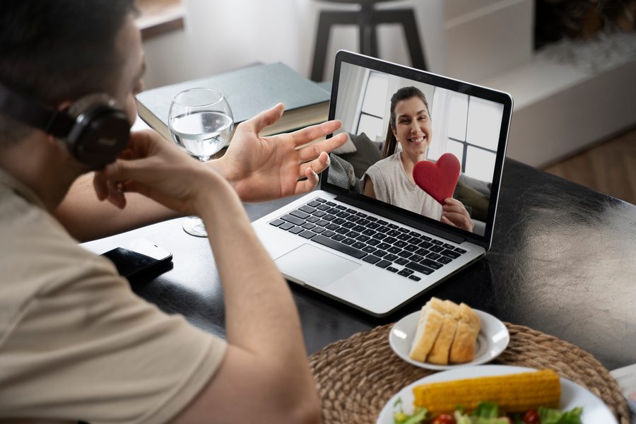 Remote wellness team members video calling on laptops with encrypted chat icons